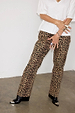 Leopard Lucia Scallop Detail Jeans styled with a white t-shirt and black pointed-toe boots.