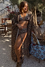 Longline leopard print kimono with contrast blue whipstitch detailing and matching bikini, styled for a poolside vacation.