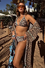 Thumbnail for Iconic Leopard Kimono with blue whipstitch trim, worn by a model in size XL for a poolside vacation look.