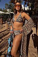 Iconic Leopard Kimono with blue whipstitch trim, worn by a model in size XL for a poolside vacation look.