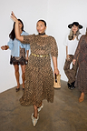Leopard Lucia Sheer Dress with puff sleeves and a tiered skirt, highlighting inclusive sizing.