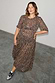 Sheer Leopard Lucia midaxi dress with puff sleeves and tiered skirt, highlighting inclusive sizing.