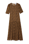 Leopard Lucia Dress featuring sheer fabric, puff sleeves and a tiered midaxi skirt on a white background.