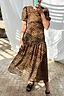Leopard Lucia Sheer Dress featuring a leopard print, low waistline and pleating at the bust.