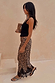 Leopard Lace Midi Maeva Skirt with a black lace border, styled with a black tank top and kitten heels.