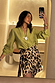 Iconic Leopard Mini Jaspre wrap skirt styled with a lime green shirt in a stylish mirror selfie.