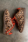 Leopard Pony Trainers featuring an iconic leopard print leather upper, contrast orange laces and a classic gum sole.