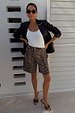 Leopard Lucia Scallop Pocket Long Shorts in brown denim, styled with a white vest and black blazer.