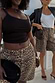 Leopard Lucia Scallop Pocket Long Shorts in brown denim, styled on two models for inclusive sizing.