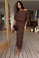 Thumbnail for Lucia Leopard Tilly Dress in iconic leopard print plisse, styled off-the-shoulder on a wooden deck.