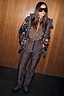 Iconic Leopard Ski Trousers paired with a matching base layer and ski jacket in an all-over leopard print.
