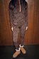 Leopard Thermal Leggings and matching zip-up top with orange trim, styled with shearling boots for a cosy ski base layer.