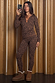 Leopard Thermal Leggings and matching quarter-zip top in iconic leopard print, shown on a model in a mirror selfie.