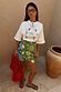 White Life Is Tough Embroidered T-Shirt with colourful slogan, styled with a celestial print wrap mini skirt.