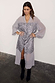 Gunmetal Sequin Lila Shirt Dress with silver sequinned panels and a grey longline silhouette on a model.