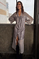 Gunmetal Sequin Lila Shirt Dress with shimmering silver sequins and a longline silhouette on a model.