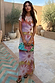 Abstract Soleil Luna Mesh Dress featuring multicoloured sun motifs on sheer mesh with short sleeves.
