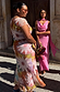 Abstract Soleil Luna Mesh Dress with multicoloured sun motifs and iconic prints on a curvy model.
