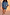 Thumbnail for Blue Lace Maeva Shorts with white lace edging, styled with a matching shirt and leopard print clutch on a model.