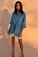 Blue Lace Maeva Shorts in washed blue satin with white lace trim and a drawstring waist, worn by a model.