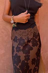 Tan Jaden Floral Maeva Midi Skirt featuring lace trim, styled with a black top and gold charm jewellery.
