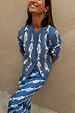 Blue Marina Hollie Cardigan with white fish motifs and button-up front, styled as a co-ord.