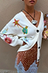 Cream Dreamer Martha Cardigan in soft-touch knit featuring colourful sun and star motifs with a button-up front.