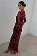 Cherry Mesh Soho Dress featuring a red digital cherry print, long sleeves and sheer mesh fabric.