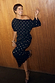 Black Tilly Plisse Dress with gold flecks, featuring an off-the-shoulder neckline and lettuce hem.