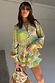 Thumbnail for Oversized Isla Miley Shirt in a hand-painted multi-coloured print, worn with matching ruffle shorts.