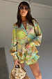 Oversized Isla Miley Shirt in a hand-painted multi-coloured print, worn with matching ruffle shorts.