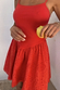 Red Broderie Mini Lola Dress in cotton featuring a cami bodice and a flared palm-patterned eyelet skirt.