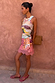 Pastel Morocco Mini Maeva Skirt featuring abstract palm and eye motifs and a pink lace border, styled with a matching top.