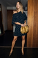 Black Plisse Mini Tilly Dress with gold metallic dots and an off-the-shoulder neckline on a model.