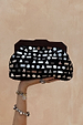 Black Beaded Mirror Bag featuring geometric silver mirrors and a dark wooden handle, held up by a hand.