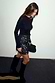 Thumbnail for Black Beaded Mirror wrap mini skirt with glass and mirror embellishments, styled with black knee-high boots.