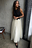 Thumbnail for Black and Cream Monika Dress with a scalloped corset-style top and pleated tulle skirt, worn by a model.
