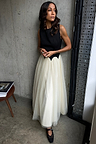 Black and Cream Monika Dress with a scalloped corset-style top and pleated tulle skirt, worn by a model.