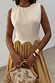 Camel Monika Dress featuring a cream corset-style top with scalloped edging and a camel pleated skirt.