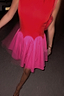 Thumbnail for Red and Pink Mini Monika Dress with a scalloped waistline and pleated skirt, captured in a night-out motion shot.