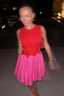 Red and Pink Mini Monika Dress featuring a panelled corset top and scalloped pleated mini skirt.