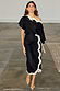 Mono Scallop Jaspre Skirt in black linen-cotton with white scallop trim, shown as a wrap style on a model.