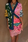 Morocco Martha Knit Cardigan with multi-coloured sun and snake motifs, paired with a pink lace-trim mini skirt.