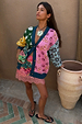 Pastel Morocco Mini Maeva Skirt with abstract motifs and pink lace trim, worn with a colour-block cardigan.