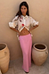 Morocco Charms Marley Shirt in cream with heart and sun motifs, worn open with a pink maxi skirt.