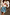 Thumbnail for Multi-wear Morocco Mini Wrap Skirt with a blue sun print and side tie, styled with a colourful patterned shirt.