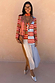 Multi Stripe Bea Dress in orange and blue with a pleated polka dot skirt, styled with a striped blazer and scarf.