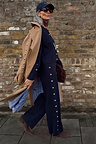 Navy Studded Knit Jogger co-ord with silver stud details, layered under a tan trench coat.