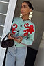 Thumbnail for Octopus Cardigan in soft blue knit featuring red embroidered octopus motifs and contrast blanket stitch detailing.