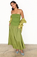 Olive Lola Mid-axi Dress in green cotton with a ruched strapless bodice, styled with a green shirt and blue heels.